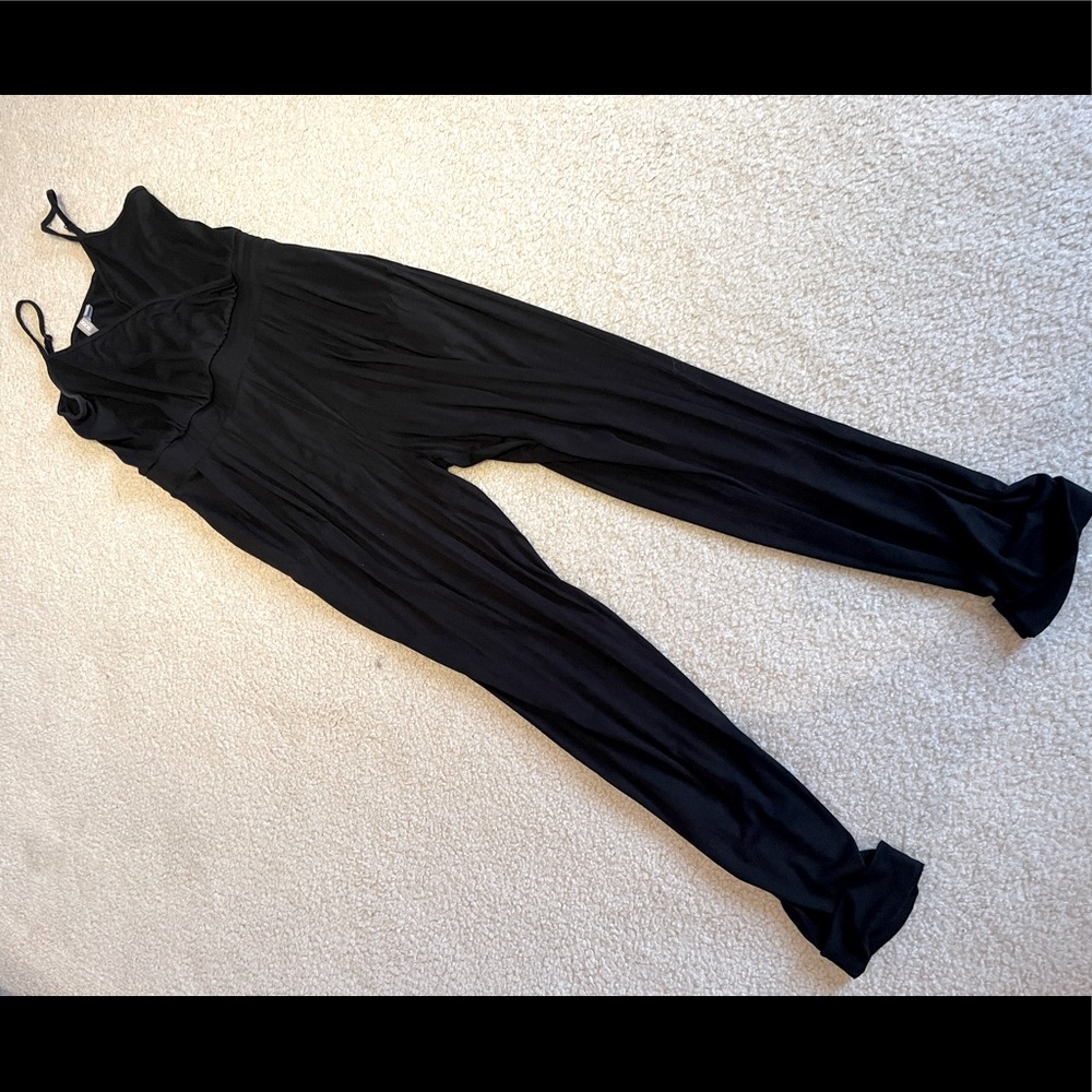 Black jumpsuit that fits on a body super well